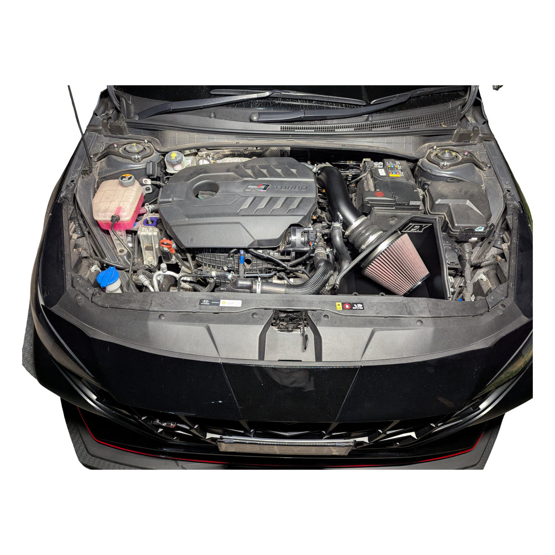 Overhead view of the i30 Sedan N engine bay with the IFX intake fitted, illustrating the top-seal airbox design that prevents heat soak.